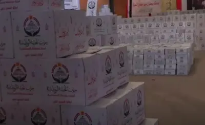 الجبهة الوطنية توزع كراتين غذائية هدية على الأسر الأولى بالرعاية بالإسكندرية