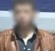 ضبط بلطجي هدد المارة بإمساكه زجاجة مياه غازية بيده في الصف