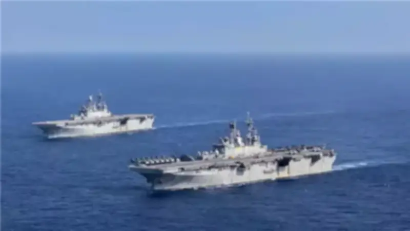 تصعيد عسكري في الشرق الأوسط: وصول سفينة أمريكية وهجمات متبادلة بين إيران وحلفائها