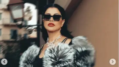 جومانا مراد تخطف الأنظار بإطلالة شتوية أنيقة في جلسة تصوير جديدة