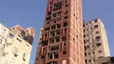 جهاز 6 أكتوبر يسحب شققًا مخالفة ويحذر من تحويل المناطق السكنية إلى تجارية