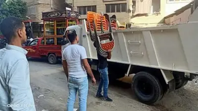 حملة الجيزة تزيل تعديات مقهى شهير بالعمرانية لاستعادة الانضباط المروري