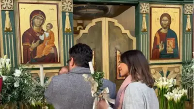 دانيلا رحمة وناصيف زيتون يحتفلان بأحد الشعانين مع طفلهما إلياس في الكنيسة