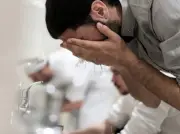 دار الإفتاء توضح حكم الاشتراط في الوضوء لذكر الله تعالى