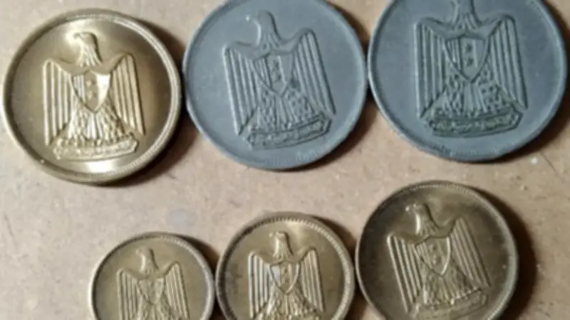 عالم مصريات ينفي وجود عملات فرعونية تظهر كائنات فضائية