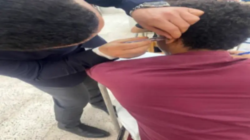 خبير تربوي يوضح الموقف القانوني لاستخراج سماعة من أذن طالب بجامعة أسيوط