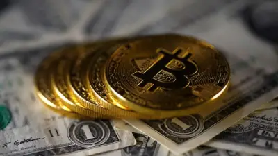 بيتكوين تهوي دون 77 ألف دولار مع تجدد التوترات بالشرق الأوسط