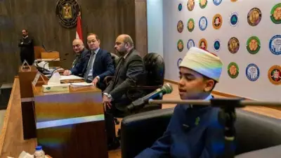 وزير المالية يحتفي بالطفل محمد القلاجي أحد نجوم دولة التلاوة