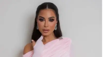 نسرين أمين تتألق بفستان أنيق في أحدث جلسة تصوير