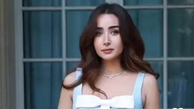 هنا الزاهد تخطف الأنظار بفستان أسود لامع في أحدث ظهور