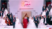 السيدة انتصار السيسي تلتقط صورة تذكارية مع ألف عريس وعروس في فرحة مصر