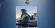 ضبط منادي سيارات يقوم بالنصب على المواطنين في النزهة الجديدة