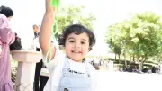 زوار حديقة الأزهر يتحدون حرارة العيد بين الشلالات وصنابير المياه