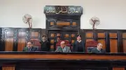 إعادة محاكمة أم متهمة بتزوير مفردات راتب طليقها في أسيوط