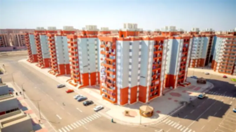 موعد القرعة العلنية لوحدات الإسكان التجارية بمدينة ملوي الجديدة يونيو 2026