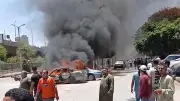 حريق يلتهم سيارتين أمام محطة شلبي وسط مدينة المنيا (صور)